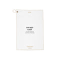I'm Not Lost golf towel — flat product view with brass grommet