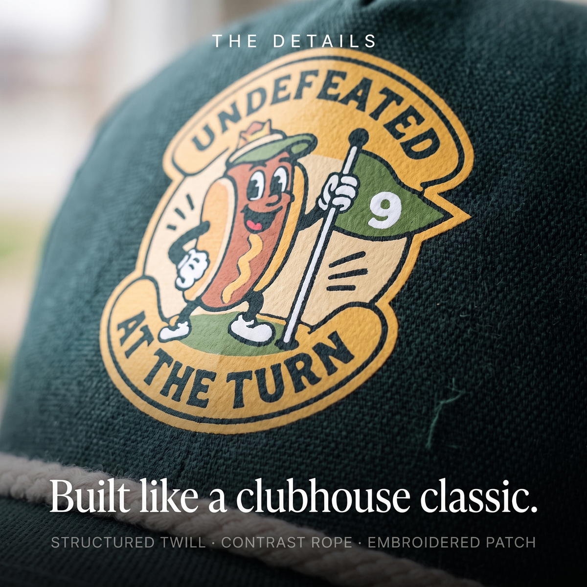 Close-up of the Undefeated at the Turn rope hat — structured twill, contrast rope, embroidered crest patch