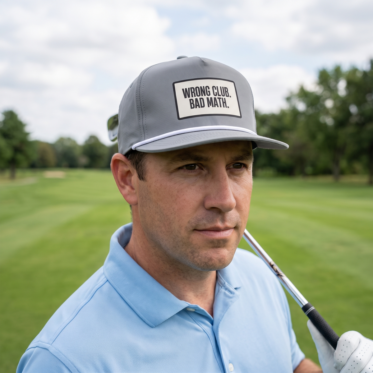 A golfer on a golf course wearing the Wrong Club. Bad Math. rope hat in Granite with a white rope.