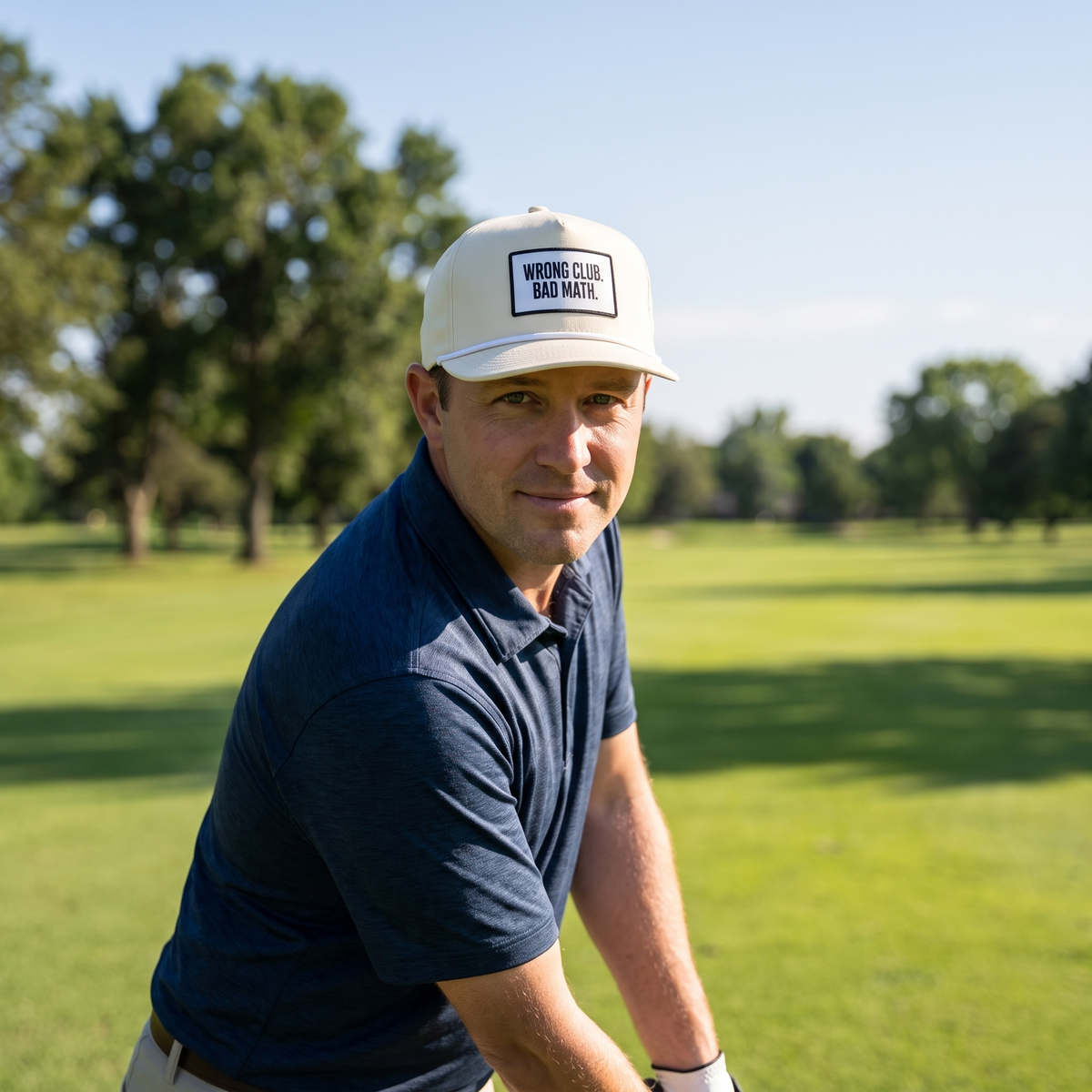 A golfer on a golf course wearing the Wrong Club. Bad Math. rope hat in Ivory with a white rope.